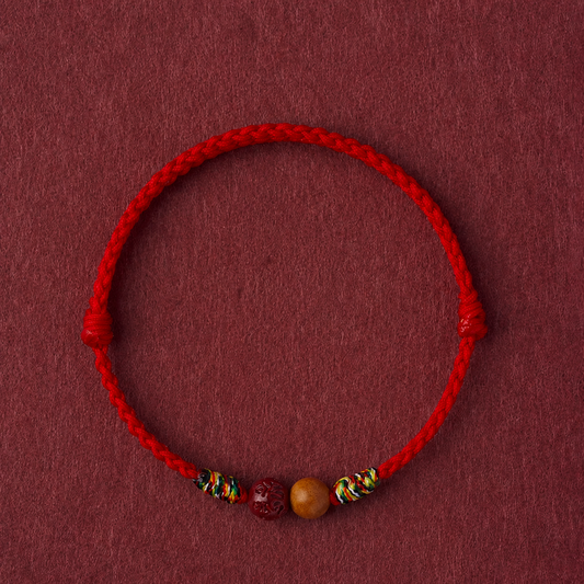 Sacred Orient Peach Wood and Cinnabar Braided Bracelet – product image 1