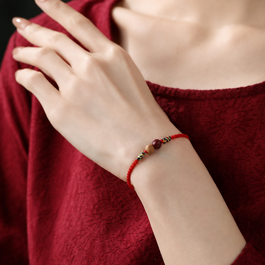 Sacred Orient Peach Wood and Cinnabar Braided Bracelet – product image 2
