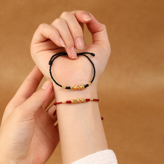 Gold-tone bead braided cord bracelet and anklet in red and black cord