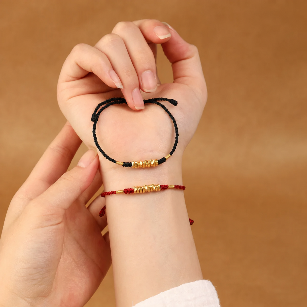 Gold-tone bead braided cord bracelet and anklet in red and black cord