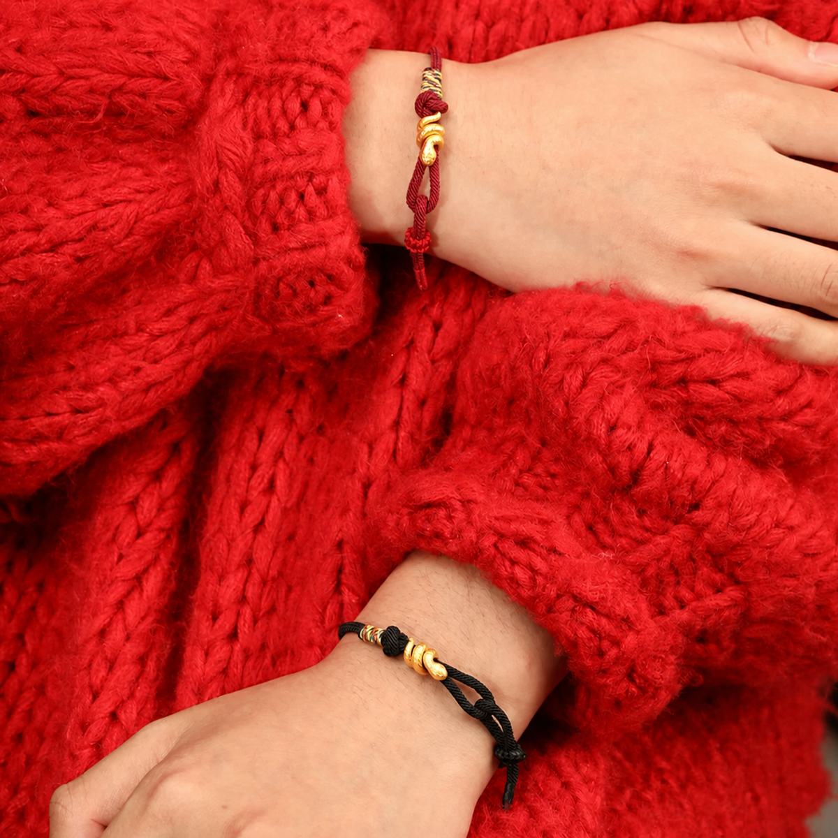 Snake motif bracelet with red, bright red, or black braided cord