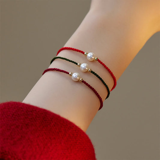 Sacred Orient Natural Pearl Bead Braided String Bracelet – product image 1